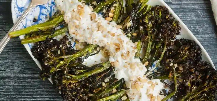 Steamed broccolini with lemon yogurt sauce