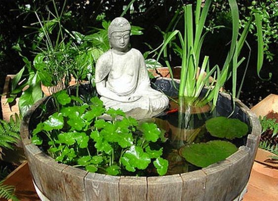 A Bali-inspired water garden in a wine barrel.