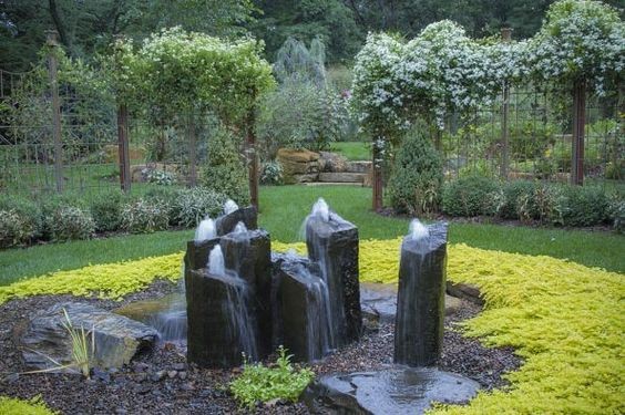 Basalt fountains as the centerpiece of a huge backyard