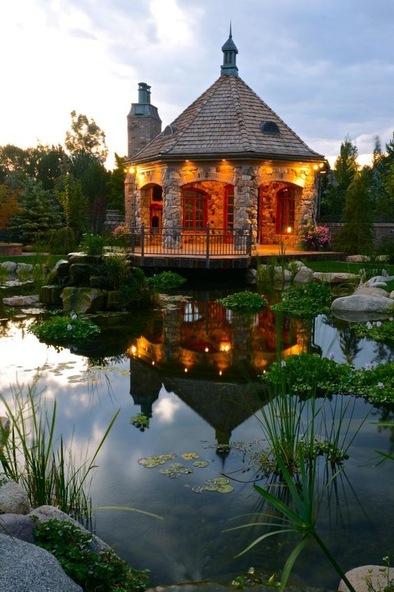 A big pavilion that can house several guests in the middle of a huge koi pond. 