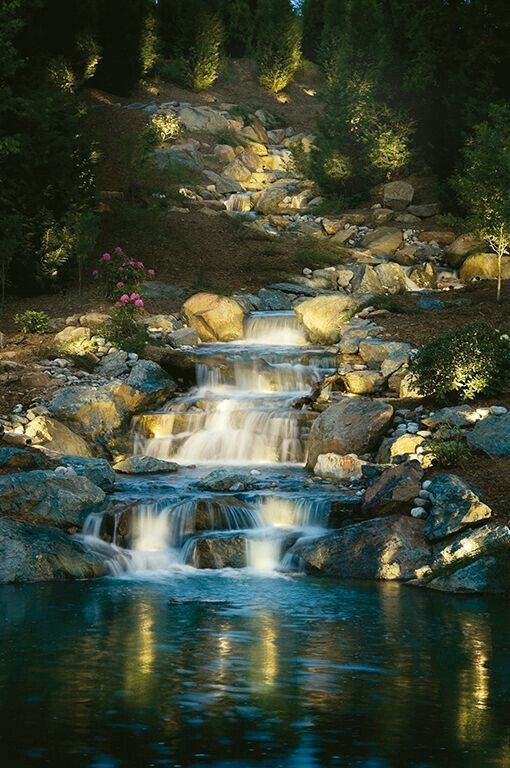 A large-scale waterfall design in a huge pond. 