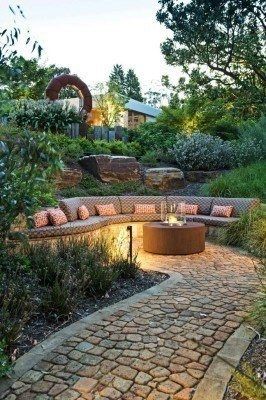 A garden pathway designed with Irregularly-shaped cobblestones. 