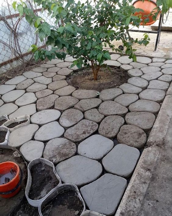 A pathway made of irregularly shaped concrete slabs.