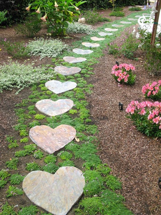A pathway filled with heart-shaped concrete slabs as stepping stones.