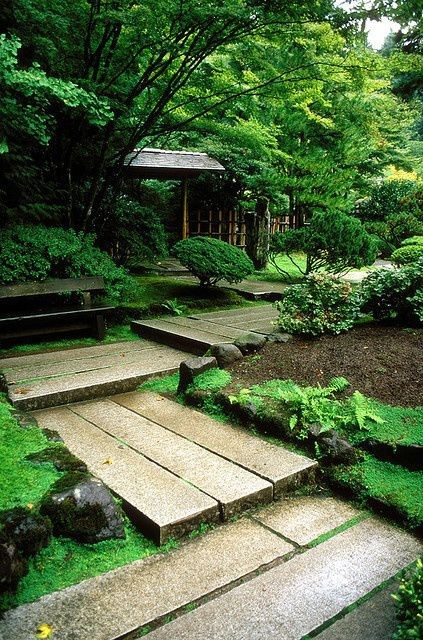 A pathway made of stacked plank-sized stone slabs.
