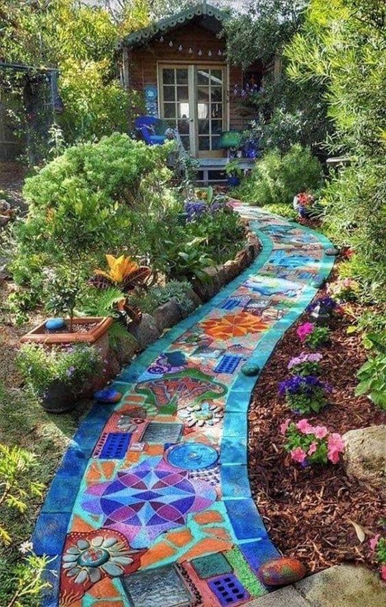 A garden path design made of different shades of blue and orange.