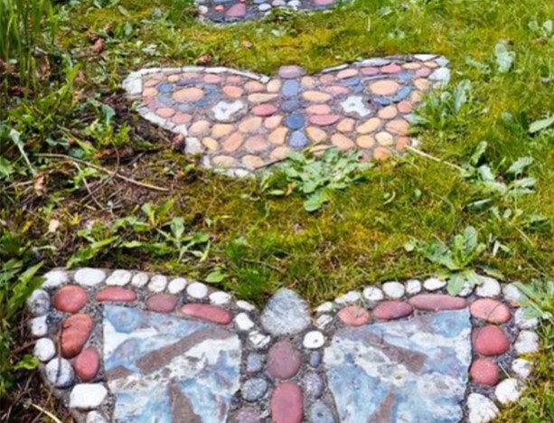 A pathway with butterfly designs