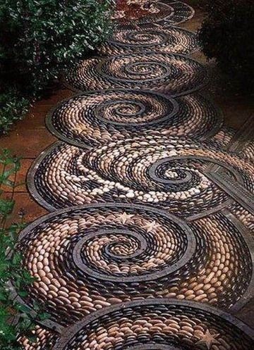 A unique garden pathway design that uses a blend of two materials to achieve the gradient effect.