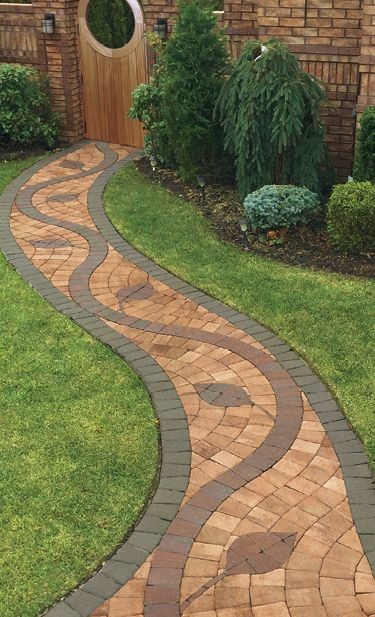 A customized pathway designed with colored cobblestones. 