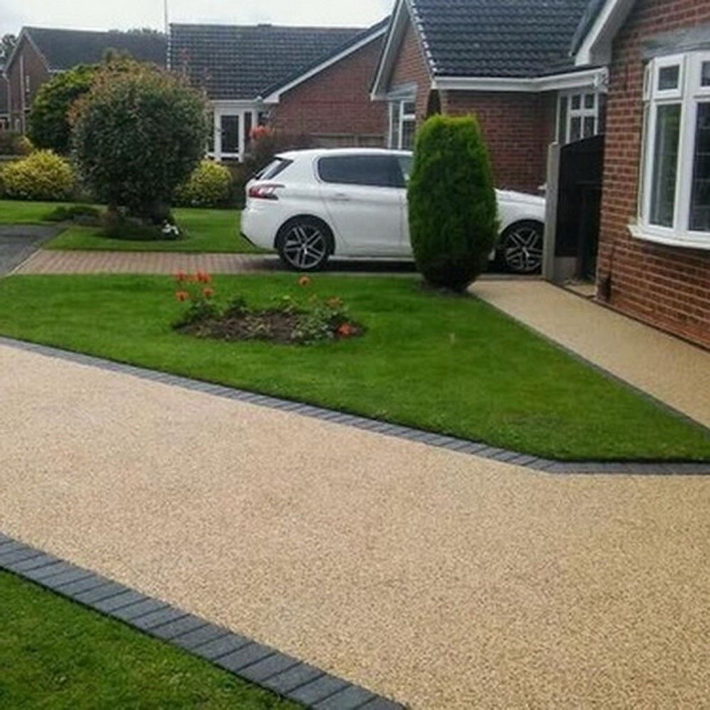 A resin-bonded front-garden pathway.