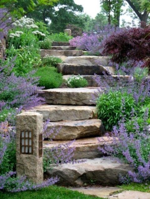 A stack of uniformly sized stone slabs serving as stairs.