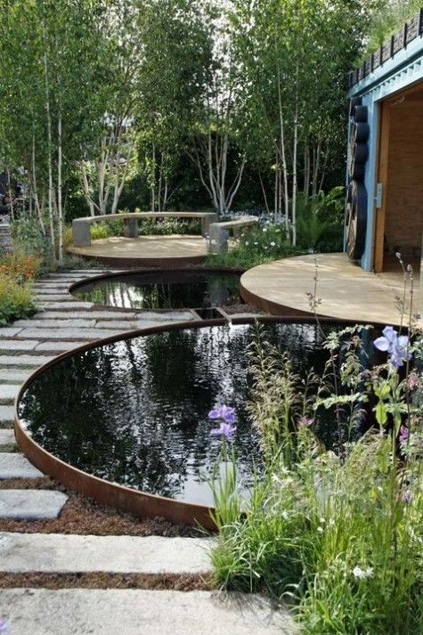 These two rounded koi ponds create a unique approach to koi keeping. 