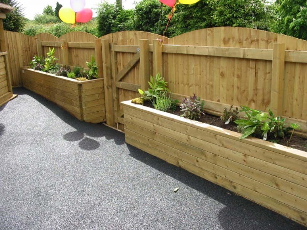 Planter boxes as straight cut garden beds.